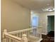 Upstairs hallway with natural light at 13913 Pinyon Pine Ln, Charlotte, NC 28215