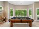 Game room featuring a pool table and a window letting in natural light at 14515 Nolen Ln, Charlotte, NC 28277