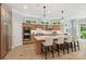 Spacious kitchen with a large center island, stainless appliances, and bright natural light at 14515 Nolen Ln, Charlotte, NC 28277