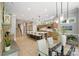 Open-concept kitchen with large island, stainless steel appliances, and breakfast nook at 14515 Nolen Ln, Charlotte, NC 28277