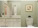 Well-lit bathroom with double sink vanity, white cabinets, and neutral decor at 1516 Croydon St, Indian Land, SC 29707