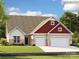 Charming single-Gathering home with a three-car garage and mixed siding exterior, nestled on a well-maintained lawn at 1516 Croydon St, Indian Land, SC 29707