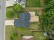Aerial shot of a house with a fenced backyard, wooden deck, and manicured lawn at 1534 Piney Church Rd, Concord, NC 28025