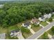 A quiet suburban street has well-maintained homes with lawns and landscaping near wooded areas at 1534 Piney Church Rd, Concord, NC 28025