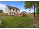 Spacious backyard with wooden deck and fence at 1534 Piney Church Rd, Concord, NC 28025