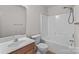 Bright bathroom with vanity, toilet, and tub/shower combination at 1534 Piney Church Rd, Concord, NC 28025