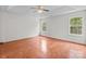 Spacious main bedroom with tray ceilings, ceiling fan, and ample natural light at 1534 Piney Church Rd, Concord, NC 28025