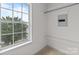 Walk-in closet with window and wire shelving at 1534 Piney Church Rd, Concord, NC 28025