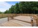 View of the wood deck with railing at 1534 Piney Church Rd, Concord, NC 28025