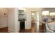 Stylish bar area featuring custom cabinetry, a beverage refrigerator, and designer lighting at 1638 Myers Park Dr, Charlotte, NC 28207