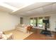 Spacious finished basement with large french doors to the outside and room for exercise or relaxing at 1638 Myers Park Dr, Charlotte, NC 28207