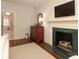 Main bedroom with fireplace and ensuite bathroom at 1638 Myers Park Dr, Charlotte, NC 28207