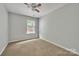 Comfortable bedroom with natural light from the window and a neutral color palette at 1915 Travertine Ln, Fort Mill, SC 29708