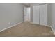 Bedroom features a closet, neutral carpet and plenty of space, ideal for relaxation at 1915 Travertine Ln, Fort Mill, SC 29708