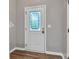 Stylish interior door featuring decorative glass and white trim, adding a touch of elegance to the home at 1915 Travertine Ln, Fort Mill, SC 29708