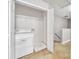 Laundry room with washer, dryer hookups, tiled floors, and white walls at 1915 Travertine Ln, Fort Mill, SC 29708