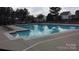 Community pool with plenty of seating at 1915 Travertine Ln, Fort Mill, SC 29708