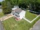 An aerial view of a two-story home with a manicured lawn and fenced backyard at 2008 Bantry Ln, Charlotte, NC 28262
