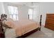 Bedroom provides soft carpet, neutral colors and large windows for natural light at 2008 Bantry Ln, Charlotte, NC 28262
