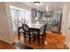 Dining area boasts tiled flooring, a big window, and a dining table at 2008 Bantry Ln, Charlotte, NC 28262