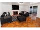 Inviting living room features a fireplace, ample seating and sliding door access to the deck at 2008 Bantry Ln, Charlotte, NC 28262