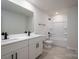 Modern bathroom featuring double vanity with black hardware, and tub/shower combination at 207 9Th Ne Ct, Conover, NC 28613