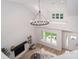 Bright, open living area featuring a fireplace, large windows, and modern decor at 207 9Th Ne Ct, Conover, NC 28613