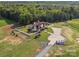 Scenic aerial view showcases the property's sprawling land, fencing, and private driveway at 2521 Neely Store Rd, Rock Hill, SC 29730