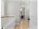 Bright bathroom with a soaking tub, tiled accents, and view into the main bedroom at 2521 Neely Store Rd, Rock Hill, SC 29730