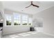 Bedroom featuring bright windows, a bed nook, and a ceiling fan at 2521 Neely Store Rd, Rock Hill, SC 29730