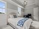 Cozy bedroom with decorative trim, a blue throw, and large windows at 2521 Neely Store Rd, Rock Hill, SC 29730