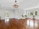 Bright bonus room featuring hardwood floors, a chandelier, and window seats at 2521 Neely Store Rd, Rock Hill, SC 29730