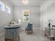 Bright home office with natural light, chandelier, and comfortable chairs at 2521 Neely Store Rd, Rock Hill, SC 29730