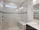 Shower with built-in bench, rain-style shower head and updated hardware at 310 N Dotger N Ave # 4, Charlotte, NC 28204