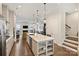 Spacious kitchen featuring a large island with seating and an integrated sink at 310 N Dotger N Ave # 4, Charlotte, NC 28204