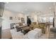 Open-concept living room flowing into the kitchen with modern decor and recessed lighting at 310 N Dotger N Ave # 4, Charlotte, NC 28204