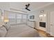 Cozy main bedroom featuring a ceiling fan, and lots of natural light with an ensuite bathroom at 310 N Dotger N Ave # 4, Charlotte, NC 28204