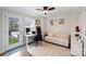 Inviting home office with natural light, desk space, and comfortable seating area at 310 N Dotger N Ave # 4, Charlotte, NC 28204