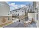 Outdoor patio with furniture overlooking the row of newly constructed townhomes at 310 N Dotger N Ave # 4, Charlotte, NC 28204