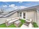 Cozy rooftop deck with stylish outdoor furniture and direct access from the house at 310 N Dotger N Ave # 4, Charlotte, NC 28204