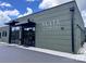 Exterior building view with 'Slate Interiors' signage at 3163 Maury St, Charlotte, NC 28208