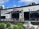 Charming exterior view with outdoor seating and attractive awnings at 3163 Maury St, Charlotte, NC 28208