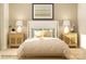This bedroom boasts neutral tones, bedside tables, and a comfy looking bed at 3882 Horsham St, Indian Land, SC 29707
