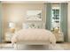 This bedroom features matching bedside tables, neutral tones, and stylish decor at 3882 Horsham St, Indian Land, SC 29707