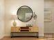 Stylish hallway console table with round mirror, lamp, vase, and decor, perfect for entry or accent at 3882 Horsham St, Indian Land, SC 29707