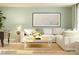 Modern living room with sectional sofa, coffee table, rug, and foosball table, great for entertaining at 3882 Horsham St, Indian Land, SC 29707