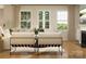 Cozy living room with modern seating, large windows, and a fireplace at 3882 Horsham St, Indian Land, SC 29707