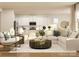 Inviting open-concept living space with a plush sofa and an adjacent modern kitchen at 3882 Horsham St, Indian Land, SC 29707