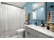 The bathroom features a modern vanity, faucet, and shower with curtain at 3900 Langley Rd, Charlotte, NC 28215