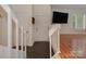 Bright foyer leads to living area with hardwood floors and shuttered window at 4025 Woodfox Dr, Charlotte, NC 28277